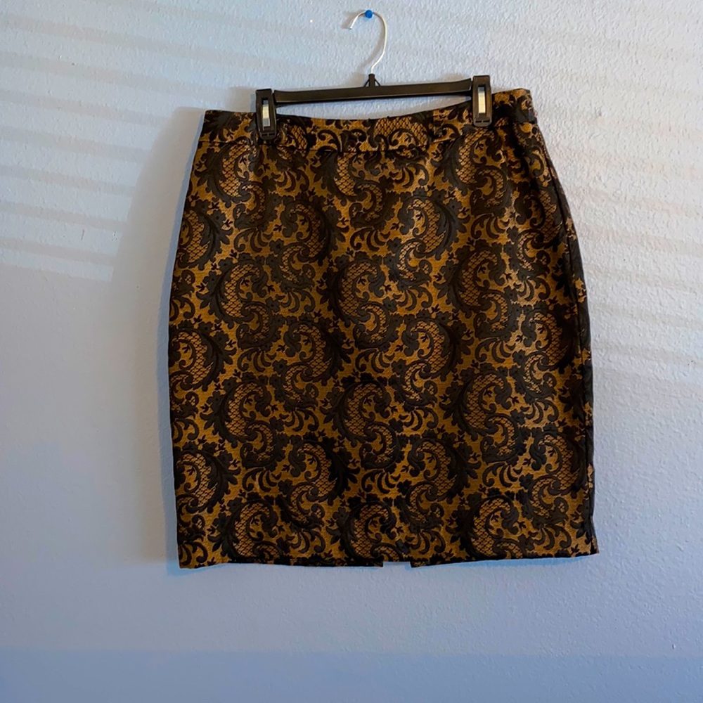 Printed black & gold skirt with back zipper. Size 14
